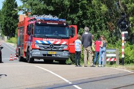 Brand langs spoorlijn in Oosthuizen