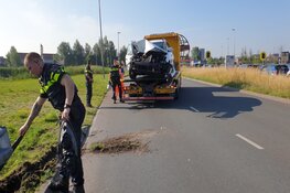 Auto tegen vangrail op Laan der Continenten