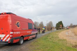 Hond en eigenaresse te water in Purmerend