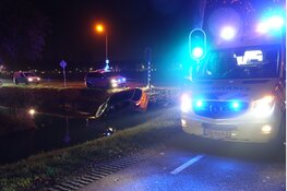 Auto te water op Westerweg