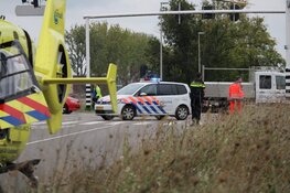 Fietser ten val: traumaheli ter plekke